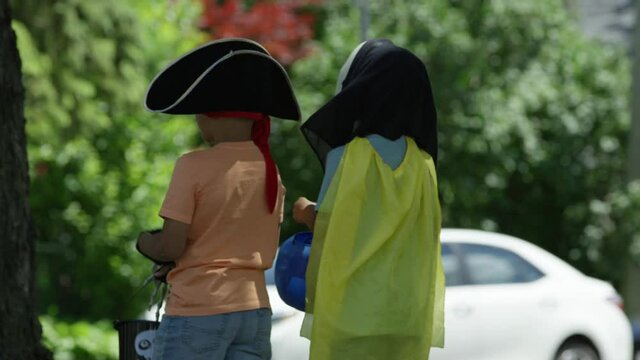 Ty Ma Kids out trick or treating on halloween in costumes