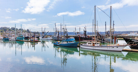 Panoramic view of commercial fishing boats in the harbor