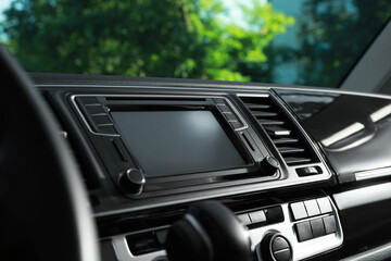 Obraz na płótnie Canvas View of dashboard with navigation system in modern car