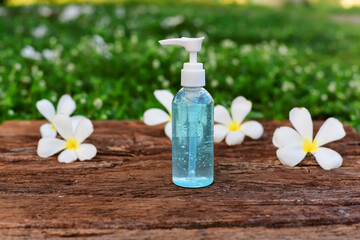 The hand sanitizer sits beautifully on the wooden floor.