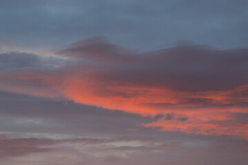 Colorful clouds on dawn sky.