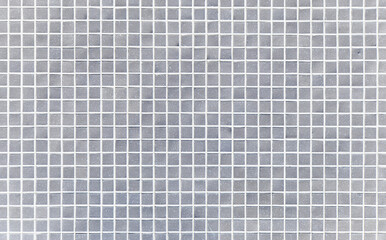 Silver gray mosaic tile texture background. Ceramic tiles on a wall.