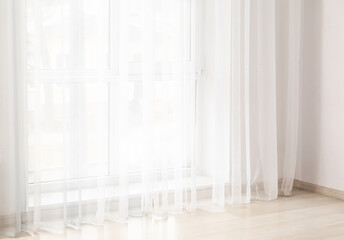 Fototapeta na wymiar Light curtains in empty room