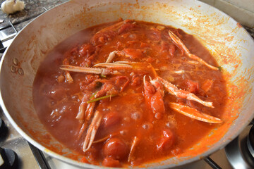 scampi and tomatoes in pan