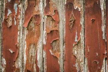 Texture of old wooden with peeling paint on wooden background.
