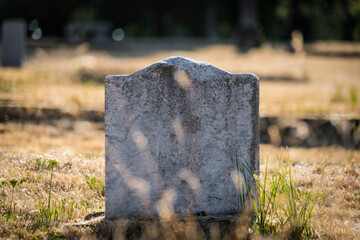 old tombstone in cemetery