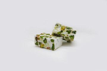 Nougat Pistachios Square Some call it Oriental Nougat, we call it Lebanese Nougat or Maban nougat . These delicious confections are filled with the tastiest of Dry Roasted Pistachios.