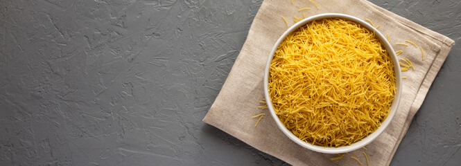 Raw Dry Filini Vermicelles Ready to Cook, top view. Overhead, from above, flat lay. Copy space.
