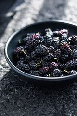 Summer fresh mulberry fruit. Healthy berries with vitamin C and antioxidants. Close-up, macro. fresh mulberry bowl. Mulberry background