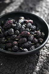 Summer fresh mulberry fruit. Healthy berries with vitamin C and antioxidants. Close-up, macro. fresh mulberry bowl. Mulberry background