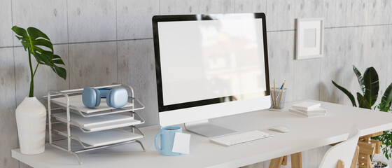 Modern workspace with mock up desktop computer with office supplies