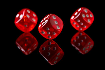 Red casino dice isolated over black reflective background