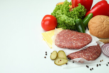 Concept of cooking burger on white background
