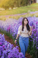 Teenager in a beautiful Margaret flower field,