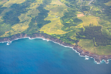 Aerial view over the ocean on west coast of Maui, Hawaii.