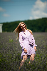 Woman on the garden field in the summer time