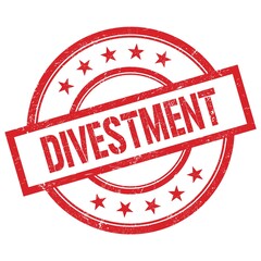 DIVESTMENT text written on red vintage round stamp.