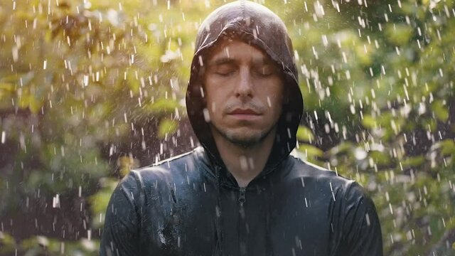 Man stands in the rain