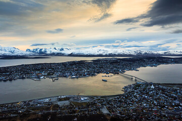 Scenic panoramic view over Tromso in northern Norway on a stormy cloudy evening, late spring with mightnight sun
