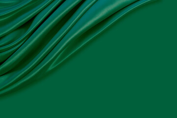 Beautiful elegant wavy emerald green satin silk luxury cloth fabric texture with monochrome background design. Copy space
