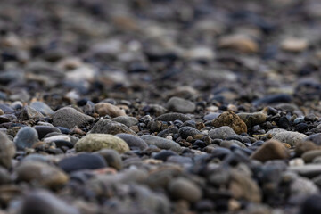 pebbles and small stones outside in natural shoreline washington beach