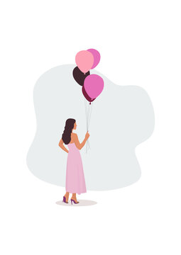 A girl in a pink dress holds balloons in her hand. The woman from the back. Beauty. An idea for a photo shoot. Holiday. Femininity