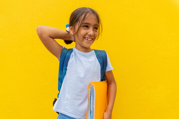 Schoolgirl very happy to go back to school. Back to school