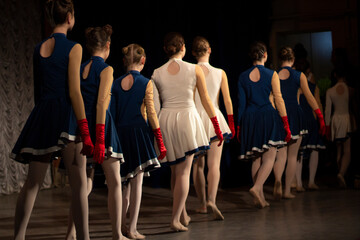 Dance lesson on stage. The girls are performing.