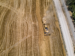 Aerial view of the tractor cultivating the land