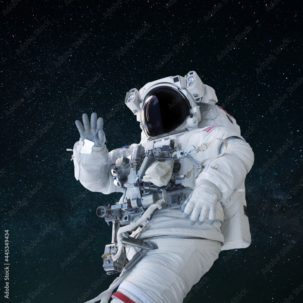 Poster space man in a suit with a helmet waves his hand and greeting in open space. hello concept. astronau