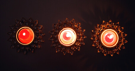 Candles for Diwali festival on a dark background