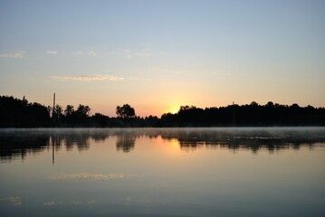 Obraz na płótnie Canvas Summer fishing on the lake, dawn.