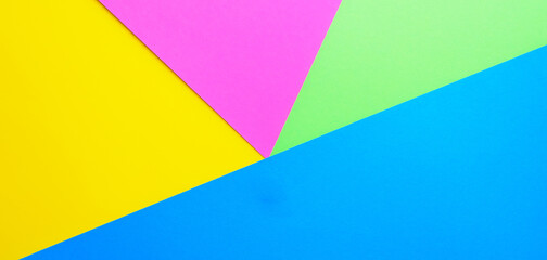 Abstract geometric background from colored paper. Paper pattern.