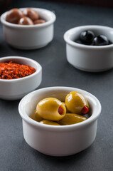 Green and black olives, paprika