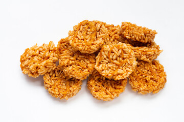 Rice cracker with coconut palm sugar on white