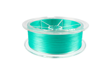 Fishing braided line isolated on white background. Spool of blue cord isolated. Spool of braided...