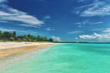 Landscape of tropical island beach cloudy blue sky