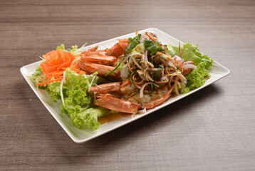 grilled bbq big tiger prawn seafood with Thai spicy chilli sauce on wood background asian halal menu