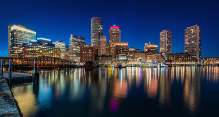 Naklejka premium Night cityscape of boston harbor