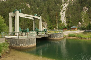 Sluice dam on the water reservoir Stierwaschboden on the river Erlauf in Oetschergraben near to the Oetscher in Austria, Europe
