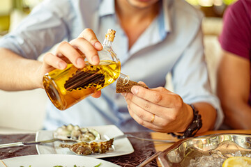 Olive oil or wine vinegar in a special glass dishes