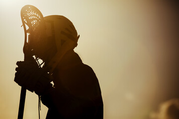 Lacrosse match, players, gear on the field, american sports themed photograph.
