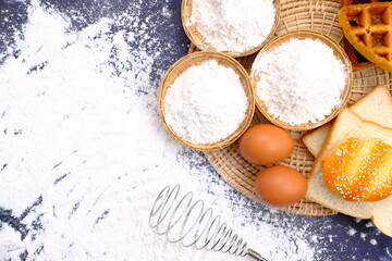 sprinkling white flour over dough on kitchen background, Baking Cooking Ingredients Flour Eggs and Butter 