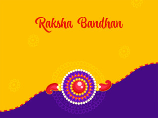 Raksha Bandhan Concept With Beautiful Pearl Rakhi On Yellow And Purple Background.