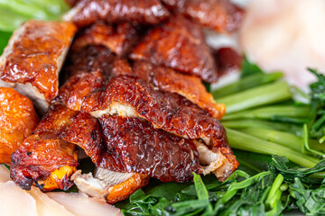 Slices of roast duck with sauces 
