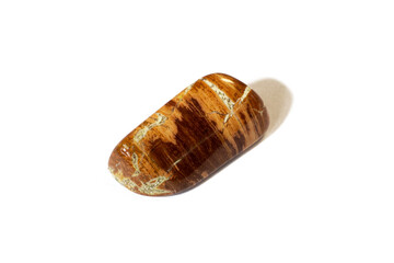 Red and multicolored jasper polished tumblestones narrow focus line, shallow depth of field macrophoto