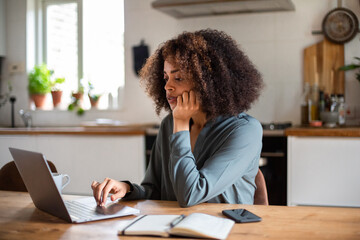 African American businesswoman working from home