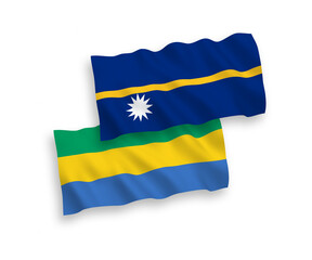Flags of Republic of Nauru and Gabon on a white background