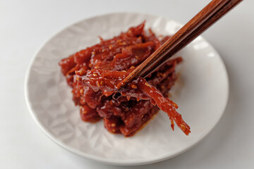 pickled deodeok on a white background