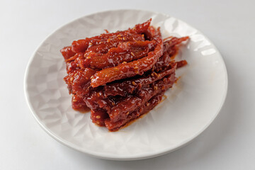 pickled deodeok on a white background